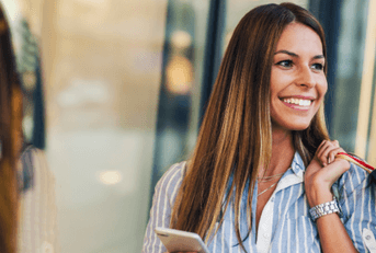 Smiling woman shopping