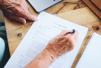 Senior signing a contract