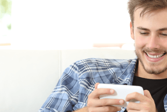 person playing game on phone