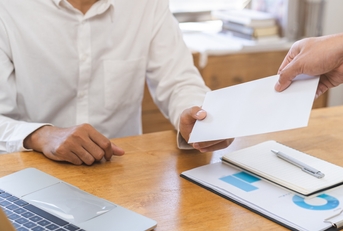 businessman giving financial reward