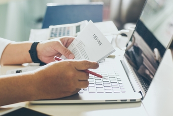 Business man review his resume