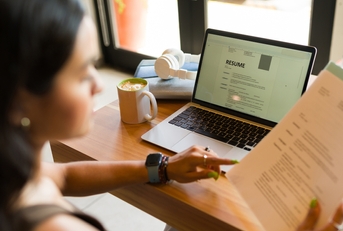 woman working on her resume
