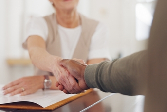 deal agreement at the office table