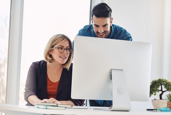 woman using a computer together