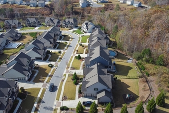 row of new developments houses in master