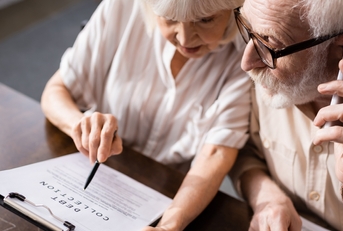 high angle view of senior man talking