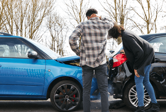 people assessing minor car accident