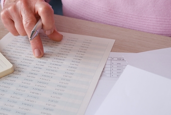 woman reviewing financial documents