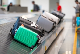 luggage bags on conveyor belt 