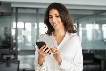 Business woman using phone
