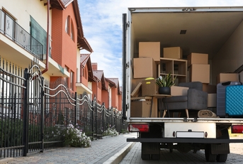 van full of moving boxes and furniture