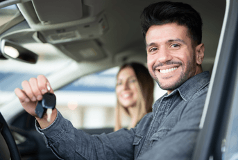 person holding car keys