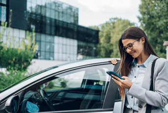 person standing by car