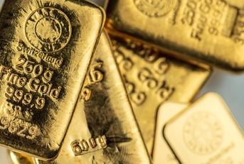 Several cast and minted gold bars