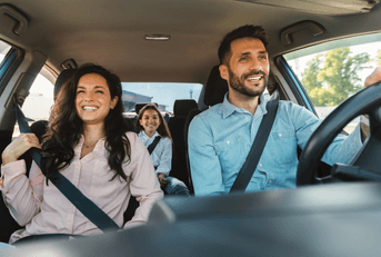 family in car