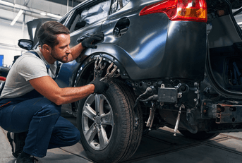 mechanic working on car