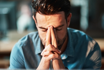 frustrated businessman with headache