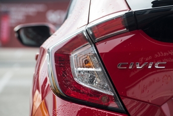 red honda civic parked