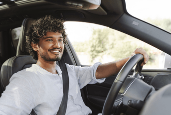 young driver at the wheel