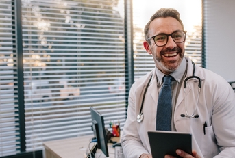 doctor with digital tablet