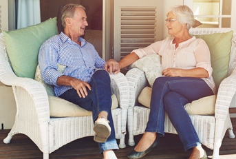 Elderly couple sharing memories