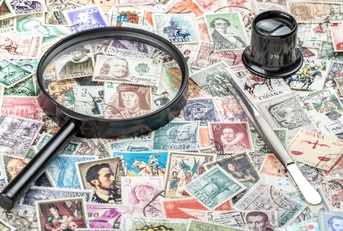 Magnifying glass, tweezers, and monocle