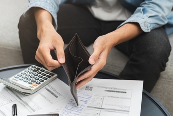 man opening an empty wallet