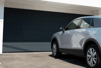 car parked outside garage