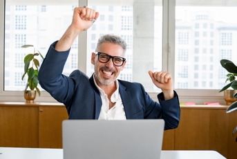 businessman is gesturing victory