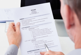 Man Holding Curriculum Vitae