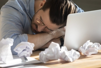 overworked employee fell asleep