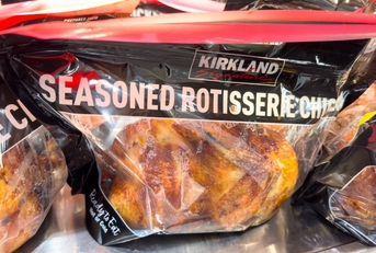 Costco Kirkland Signature fresh seasoned whole rotisserie chicken in a bag