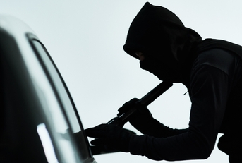 criminal attempting to steal a car