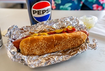 Costco hotdog with a fountain drink