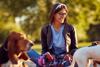 Woman walking dogs