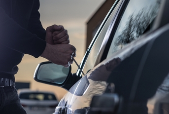 trying to break into car 