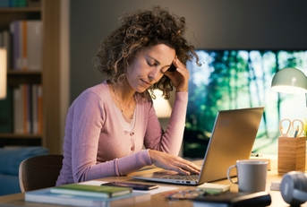Stressed woman working from home