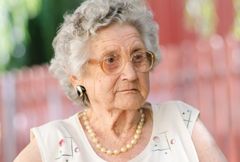 elderly woman wearing glasses