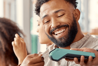 person paying with credit card