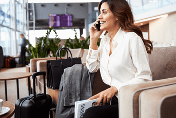 Business woman in an airport lounge