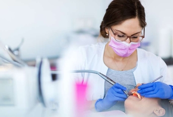 dentist and patient in dentist office