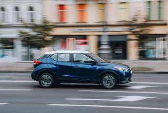 nissan kicks driving on city road