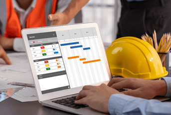 construction manager on laptop