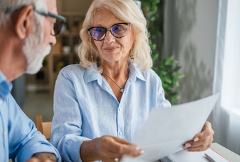 Senior couple discussing finances and retirement planning