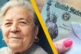 older woman smiling with social security check