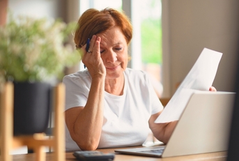 Woman stressed out with bills