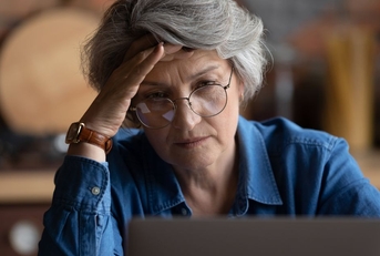 frustrated woman on laptop