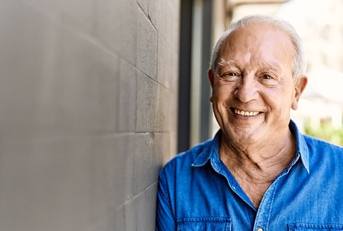 Man in his 70s smiling 