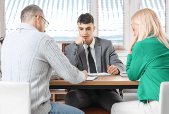 Couple with divorce lawyer