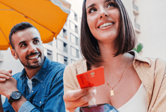 couple paying with credit card